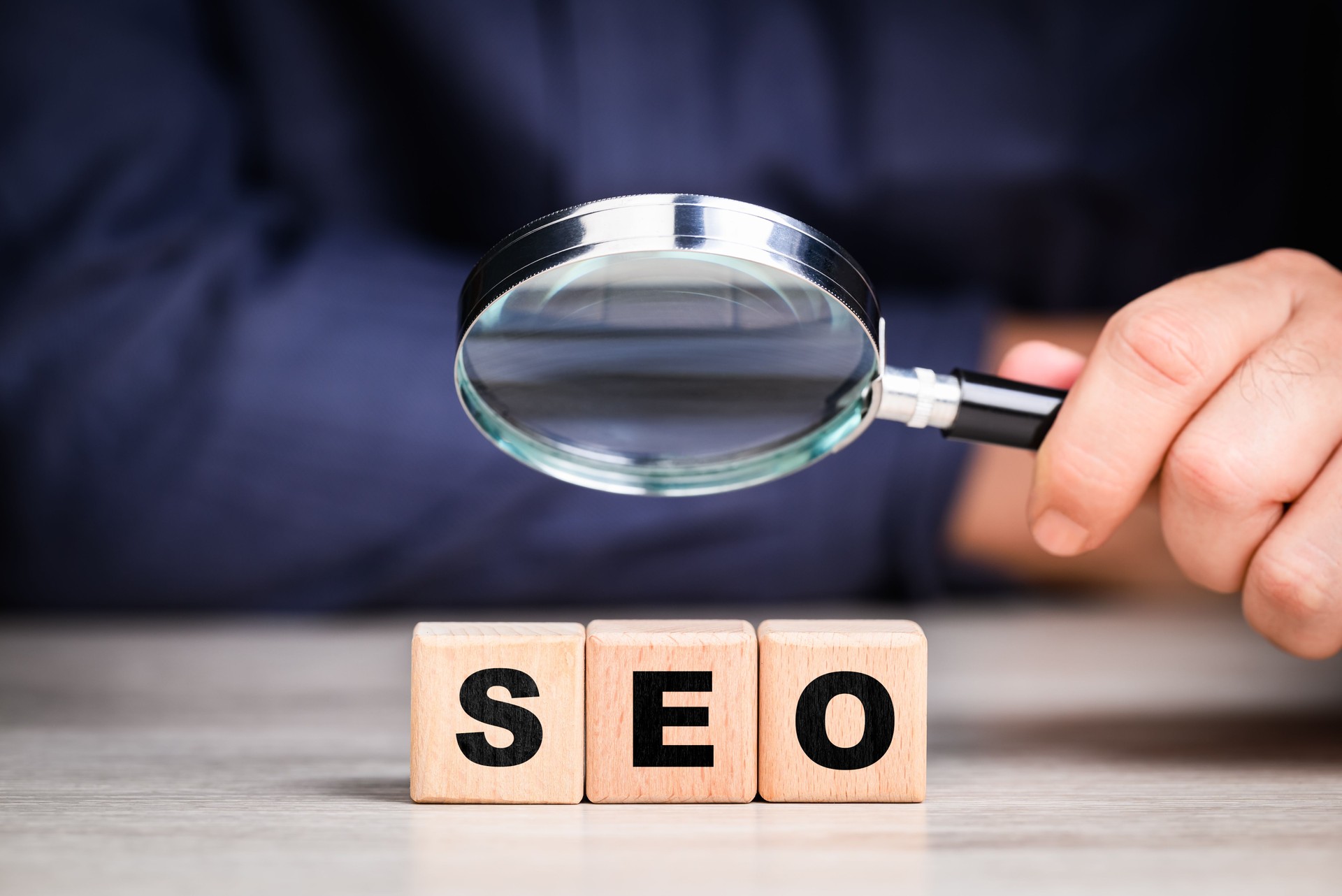 Magnifying glass over SEO concept